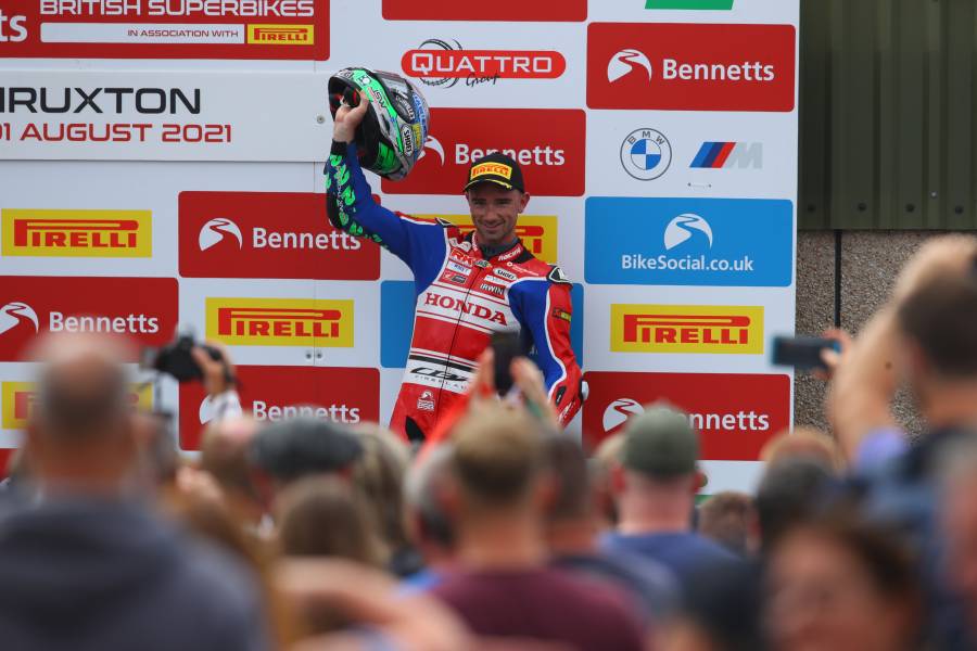 Irwin on the podium after finishing third in round four