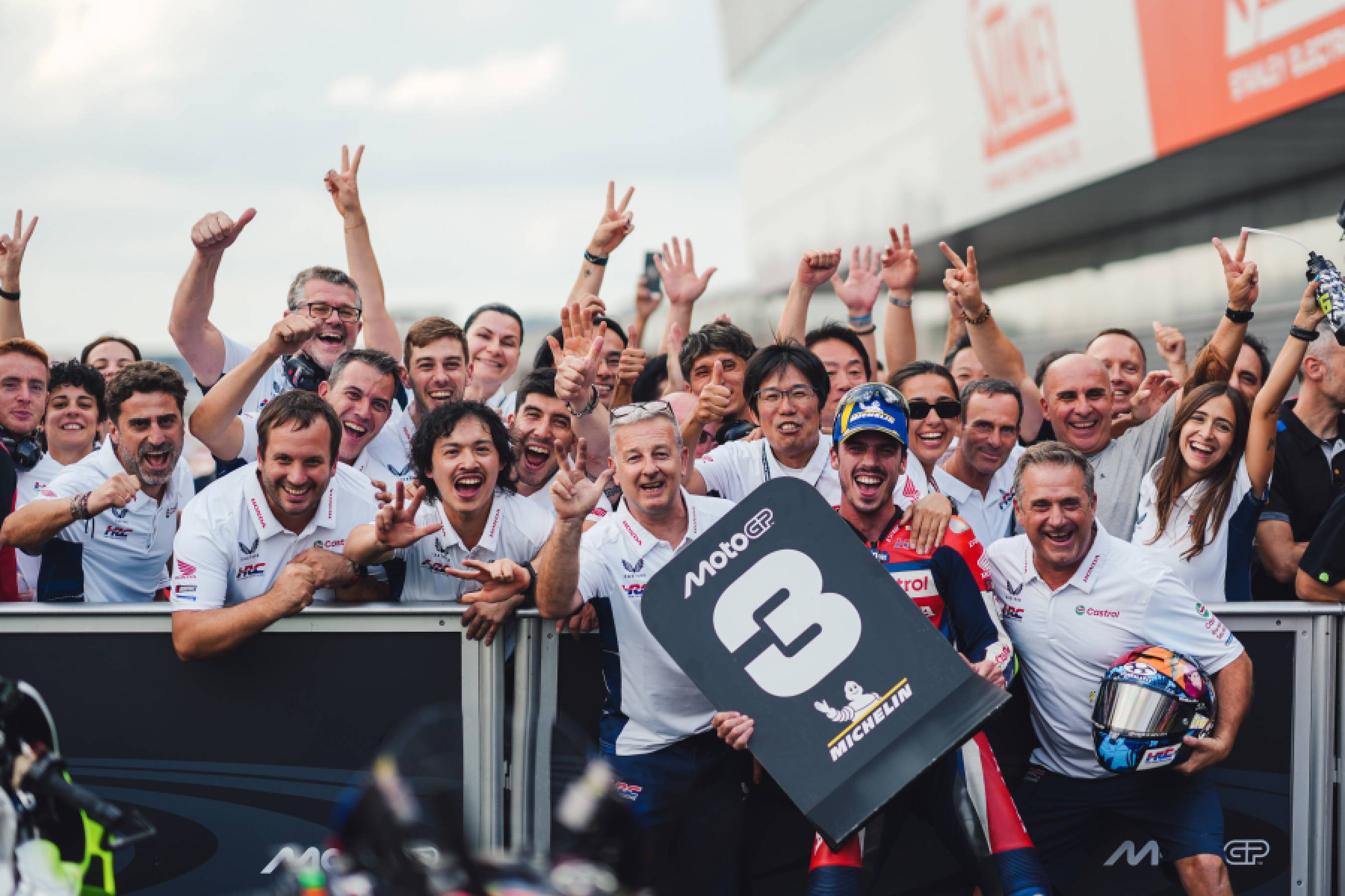 Joan Mir celebrates finishing 3rd at the 2025 Japanese Grand Prix with the Honda HRC Castrol team