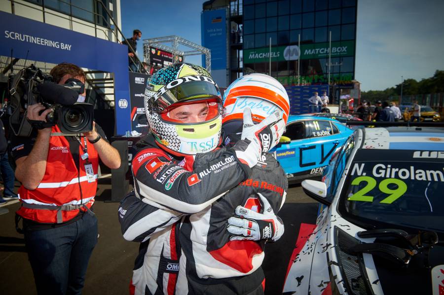 Attila Tassi celebrates his first WTCR podium with race winner Nestor Girolami