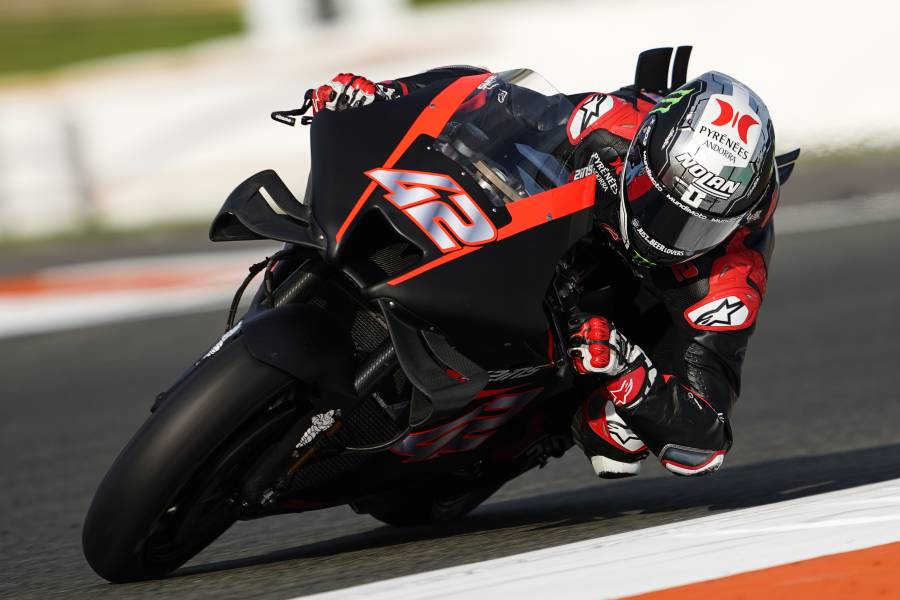 What does the head of the motorcycle racing sector say about the 'blade held to his throat'?