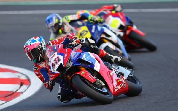 Tom Neave charges from twenty-third on the grid to fourteenth at the flag